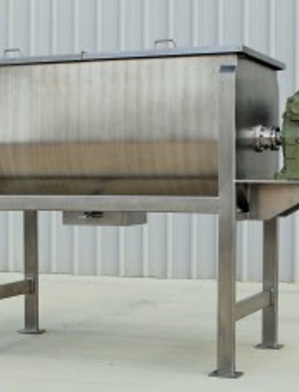 guest how with wood siding and vibrant landscaping