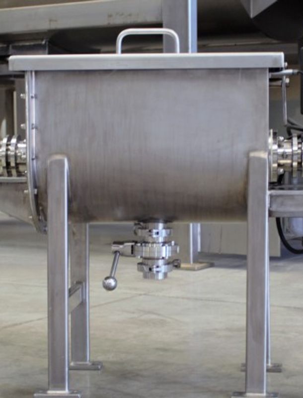 guest how with wood siding and vibrant landscaping