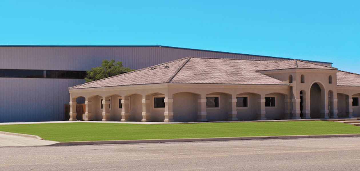 crew inside the shop working on cabinet painting